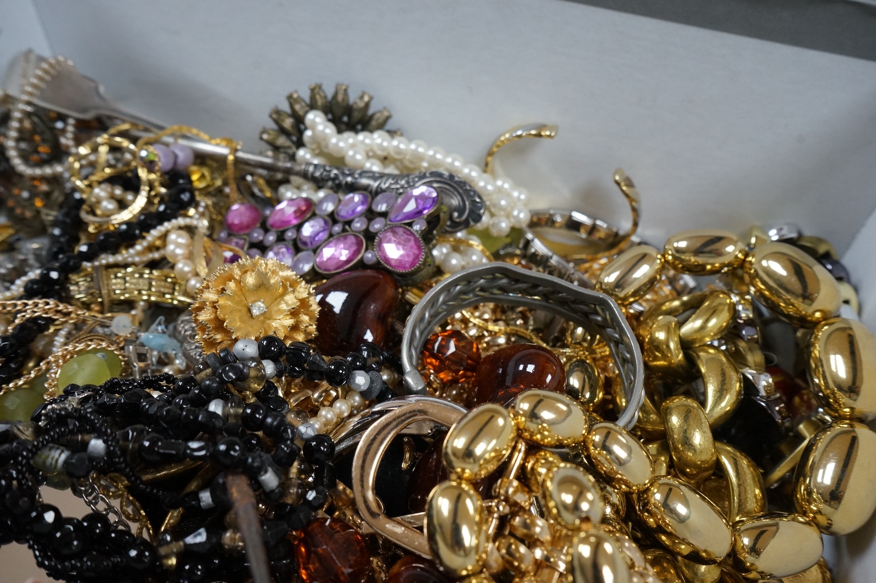 A quantity of assorted recent costume jewellery and two silver handled button hooks.